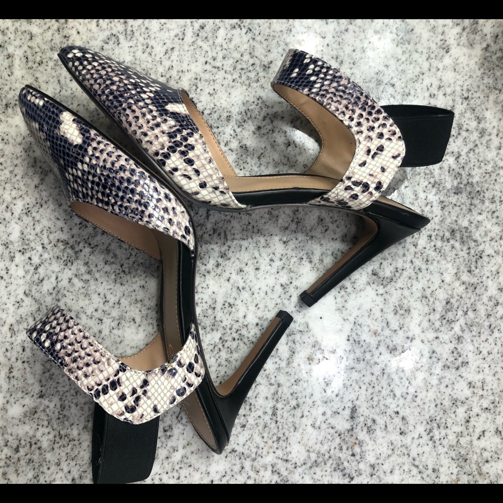 Franco Sarto black and snakeskin pump.